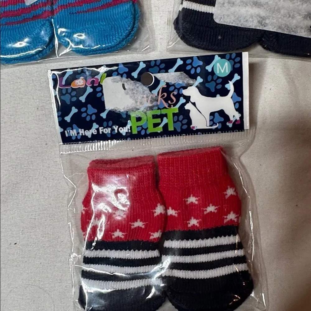 Three Sets Of Dog Socks. Size Medium. New.